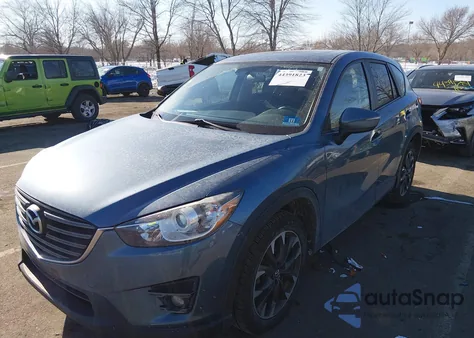 2016 Mazda Cx-5 Grand Touring z USA, uszkodzony, nr VIN JM3KE4DY4G0853410